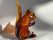 glass squirrel with cremation ash